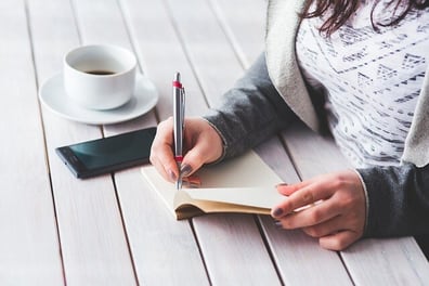 body-woman-pencil-writing-notebook-cc0-pixabay