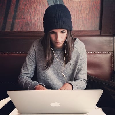 body_student_black_hat_laptop